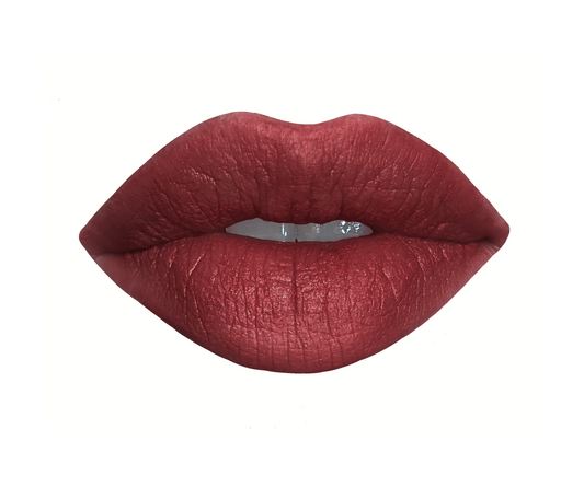 Handcrafted burgundy mauve lipstick swatch in shade "I am Empowered" made by Velvet Cosmetics