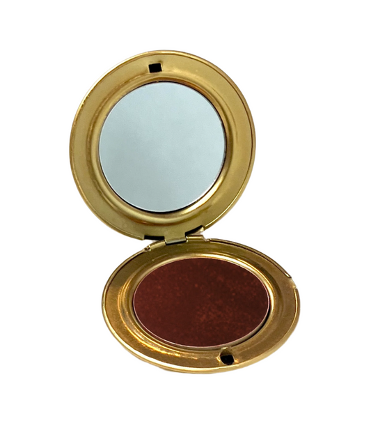 Deep wine cream blush by Velvet Cosmetics in shade "Sealed with a Kiss", a lightweight buildable formula with metal compact